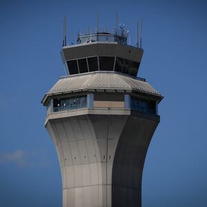 The FAA Air Traffic Control tower at Newark Liberty International Airport in Newark, New Jersey on May 7, 2025. Regulators have been slowing arrivals and departures at one of the United States' busiest airports following a 90-second traffic control system outage last week that has industry experts sounding alarm bells.