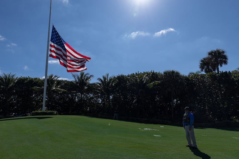 A U.S. flag flies half-mast at Mar-a-Lago on Jan. 7.