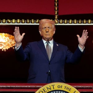 President Donald Trump looks down from the Presidential Box in the Opera House at the John F. Kennedy Center for the Performing Arts