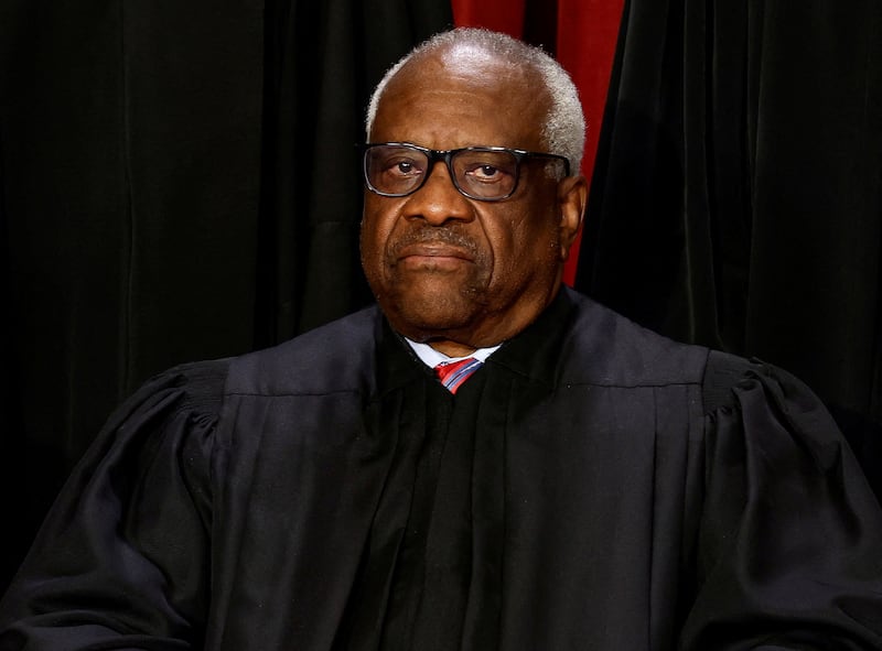 U.S. Supreme Court Associate Justice Clarence Thomas poses during a group portrait at the Supreme Court in Washington, U.S., October 7, 2022.