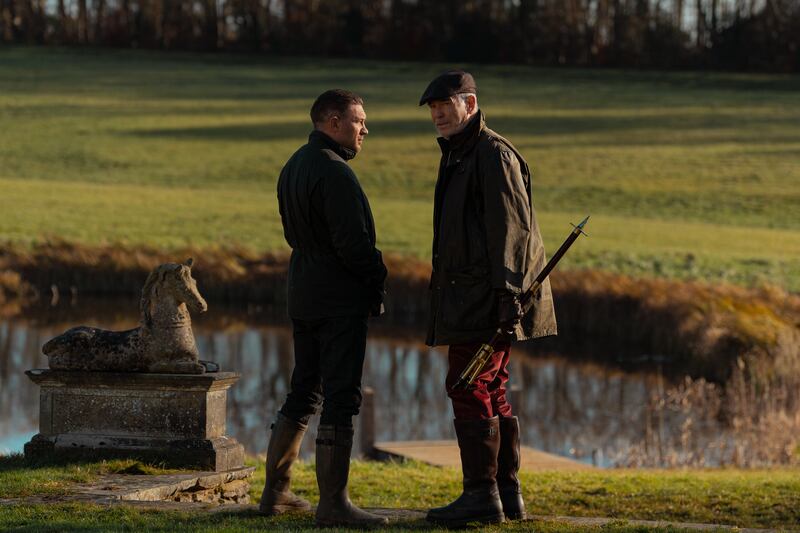 Tom Hardy as Harry Da Souza and Pierce Brosnan as Conrad Harrigan.