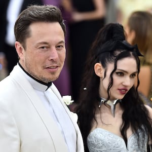 NEW YORK, NY - MAY 07:  Elon Musk and Grimes attend the Heavenly Bodies: Fashion & The Catholic Imagination Costume Institute Gala at The Metropolitan Museum of Art on May 7, 2018 in New York City.  (Photo by Theo Wargo/Getty Images for Huffington Post)