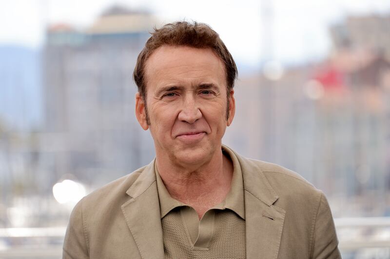A photo including Nicolas Cage