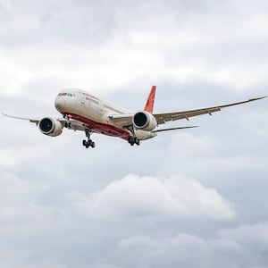 Air India Boeing 787 Dreamliner aircraft as seen on final approach flying for landing at London Heathrow Airport.