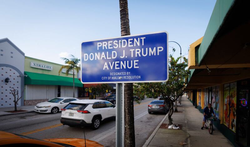 The sign "President Donald J. Trump Avenue" sits on Palm Ave during the day on Monday, Nov. 25, 2024, after its designation in Hialeah. (Alie Skowronski/Miami Herald/Tribune News Service via Getty Images)
