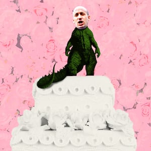 Stephen Miller's head on Gozilla on top of a wedding cake