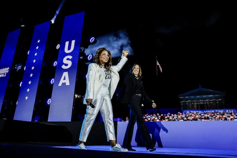 Oprah Winfrey and Kamala Harris attend a campaign in Philadelphia on November 4, 2024.