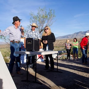 Michele Fiore (center) speaks with community members