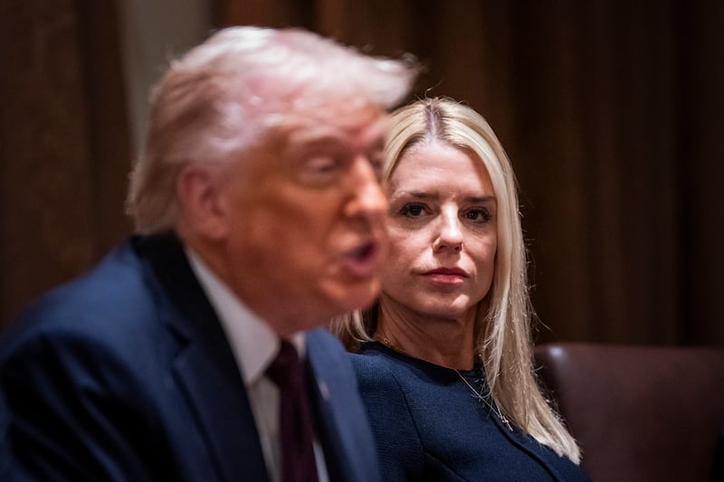 President Donald J Trump, flanked by Attorney General Pam Bondi, speaks during a cabinet meeting at the White House on March 24, 2025 in Washington, D.C.