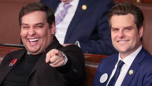 Former U.S. Rep. George Santos (R-NY) (L) sits with Rep. Matt Gaetz (R-FL) at U.S. President Joe Biden's State of the Union address.