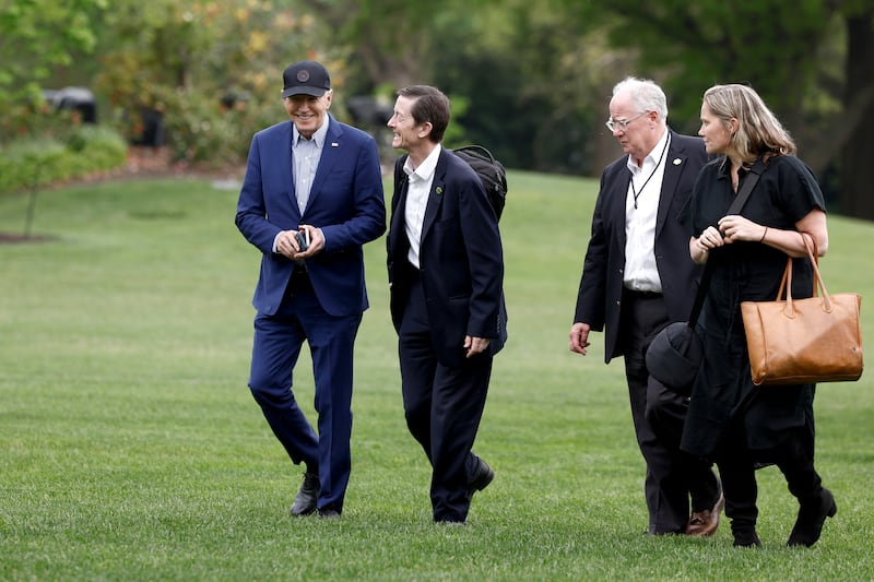 Joe Biden walks to the White House with senior members of his staff, including Bruce Reed, assistant to the president and deputy chief of staff; Mike Donilon, senior advisor; and Deputy Chief of Staff Annie Tomasini.