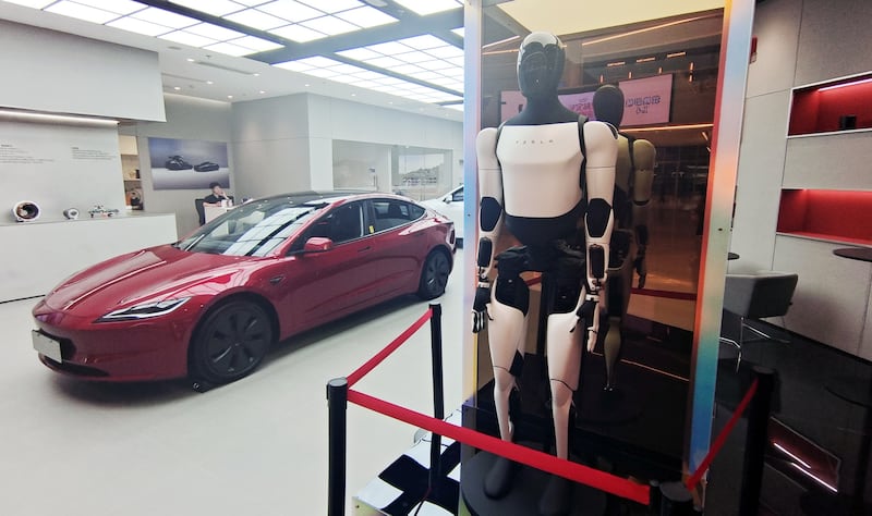 Loudon eagerly awaits the day when Tesla's Optimus can give back rubs.