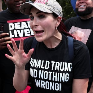Laura Loomer argues with anti-Trump demonstrators in Atlanta, Georgia, on August 24, 2023.