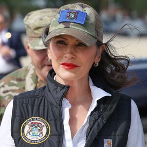 Michigan Gov. Gretchen Whitmer arrives to greet President Donald Trump at the Selfridge air base