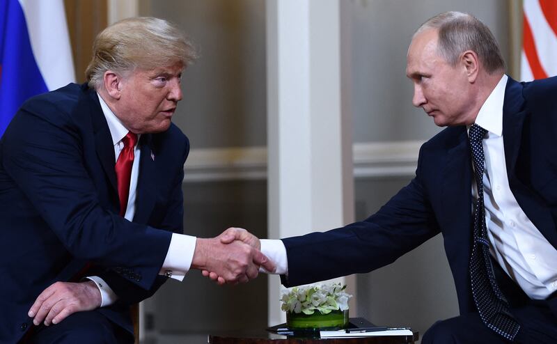 Russian President Vladimir Putin and President Donald Trump shook hands during a meeting in Helsinki on July 16, 2018.