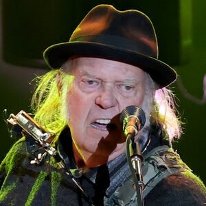 LOS ANGELES, CALIFORNIA - APRIL 26: Neil Young performs onstage at Light Up the Blues 7 Concert Celebrating Autism Speaks' 20th Anniversary at The Greek Theatre on April 26, 2025 in Los Angeles, California. (Photo by Kevin Winter/Getty Images)