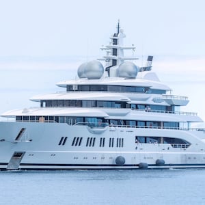The yacht Amadea of sanctioned Russian Oligarch Suleiman Kerimov, seized by the Fiji government at the request of the US, arrives at the Honolulu Harbor, Hawaii, June 16, 2022. A Fiji court on June 7 handed the Russian superyacht to US authorities and said it can be removed from the Pacific nation, ending a contested eight-week stay. The $300 million Amadea, linked by the United States to billionaire Russian politician Suleiman Kerimov, a target of sanctions, was impounded on arrival in Fiji in April at Washington's request. (Photo by Eugene TANNER / AFP) (Photo by EUGENE TANNER/AFP via Getty Images)