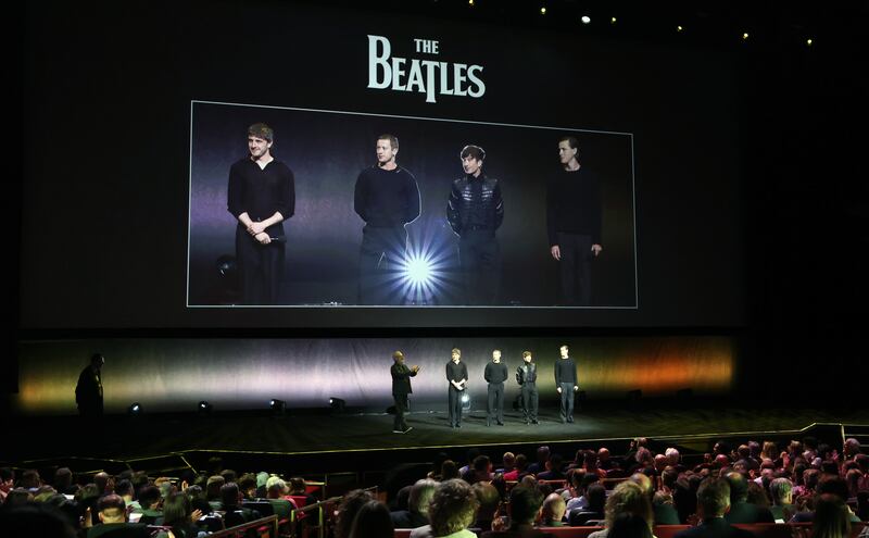 LAS VEGAS, NEVADA - MARCH 31:  (L-R) Sony Pictures Entertainment Chairman and CEO Tom Rothman, Sam Mendes, Paul Mescal, Joseph Quinn, Barry Keoghan and Harris Dickinson speak onstage to promote the upcoming films "The Beatles: A Four-Film Cinematic Event" at the Sony Pictures Entertainment presentation during CinemaCon, the official convention of Cinema United,  at The Colosseum at Caesars Palace on March 31, 2025 in Las Vegas, Nevada.
