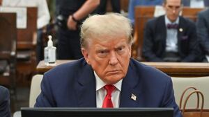 Former US President Donald Trump sits inside the courtroom for the third day of his civil fraud trial in New York