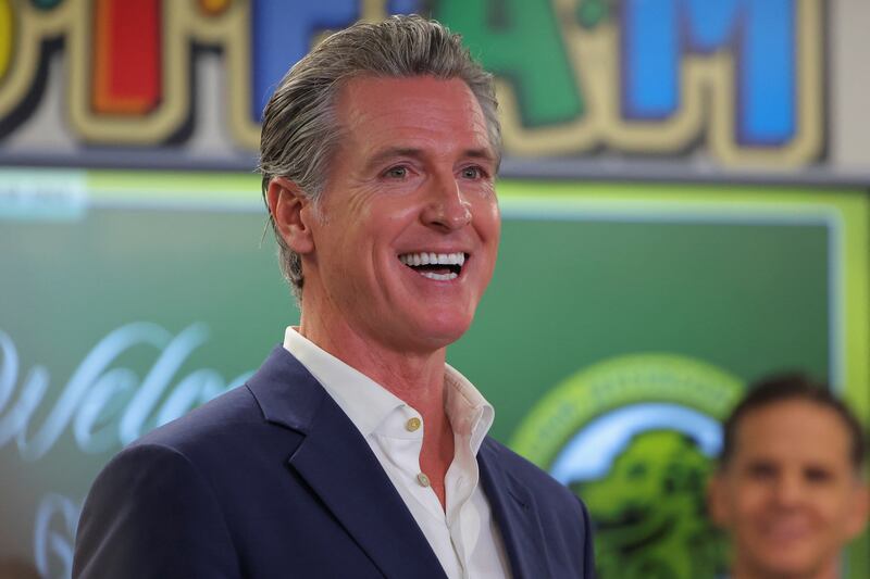 California Governor Gavin Newsom smiles as he speaks at the Clinton Elementary School in Compton, California.