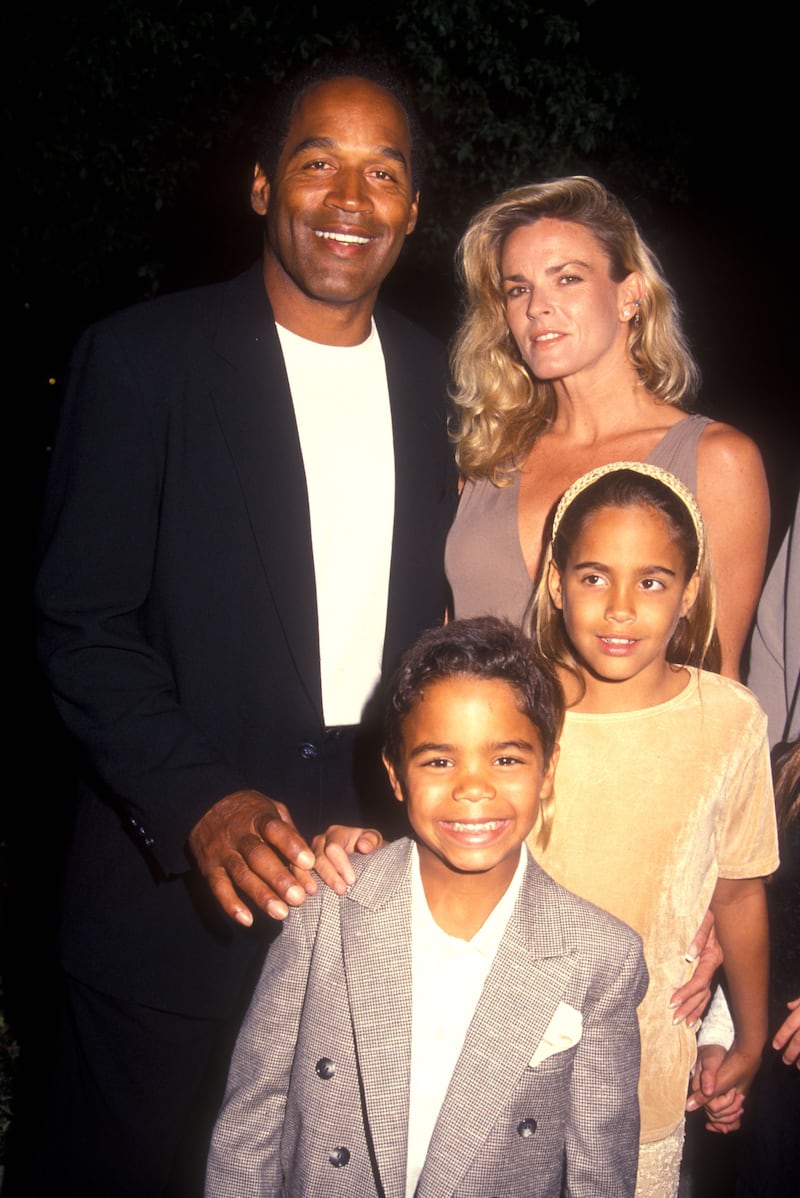 O.J. Simpson, Nicole Brown Simpson and O.J.'s children attend the Naked Gun 33 1/3 Premiere at the Paramount Pictures Studio Backlot in Hollywood, CA.
