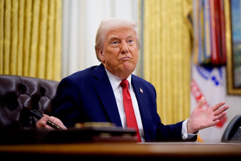 U.S. President Donald Trump gestures while speaking during an executive order signing event in the Oval Office of the White House on March 31, 2025 in Washington, DC.