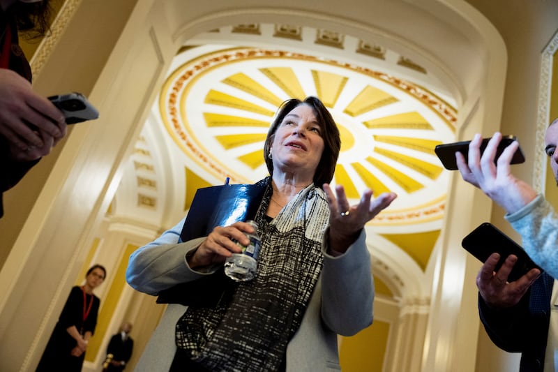 U.S. Senator Amy Klobuchar speaks to reporters between votes at the U.S. Capitol on January 23, 2024.
