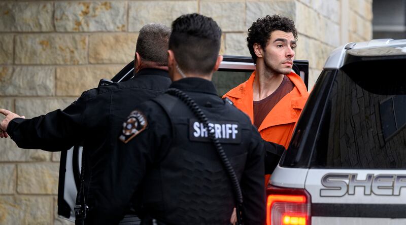Luigi Mangione is led into the Blair County Courthouse for an extradition hearing Dec. 10, 2024 in Hollidaysburg, Pennsylvania.