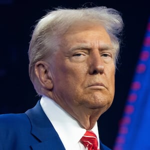 U.S. President-elect Donald Trump looks on during Turning Point USA's AmericaFest at the Phoenix Convention Center on December 22, 2024 in Phoenix, Arizona. The annual four day conference geared toward energizing and connecting conservative youth hosts some of the country's leading conservative politicians and activists.
