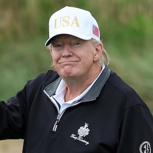 Donald Trump plays golf at his resort in Balmedie, Scotland.