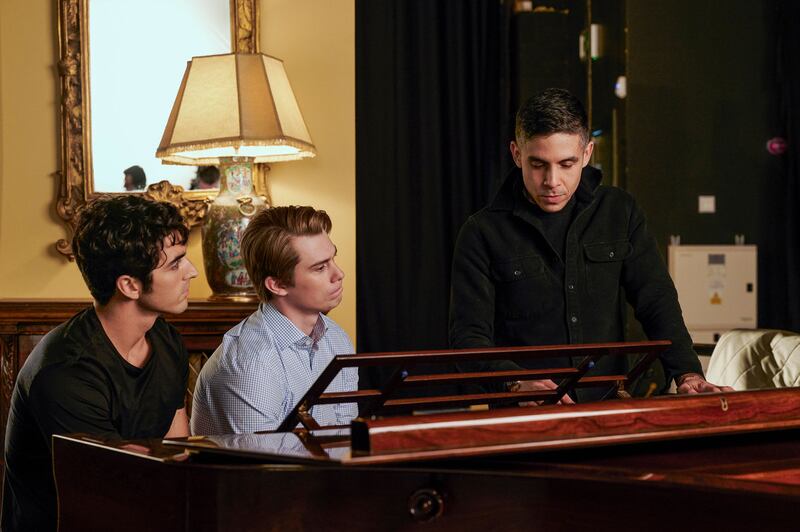 A behind-the-scenes picture from Red, White and Royal Blue that shows Nicholas Galitzine and Taylor Zakhar Perez.