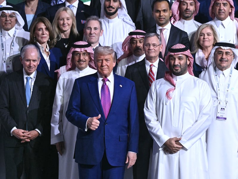 US President Donald Trump (front row-C) and Saudi Crown Prince Mohammed Bin Salman (C-R) pose for a group picture during the Saudi-US investment forum at the King Abdul Aziz International Conference Center in Riyadh on May 13, 2025.