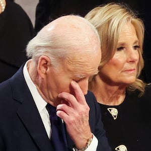 U.S. President Joe Biden reacts during a service, on the day of the State Funeral for former U.S. President Jimmy Carter at the Washington National Cathedral in Washington, U.S., January 9, 2025. REUTERS/Brendan McDermid