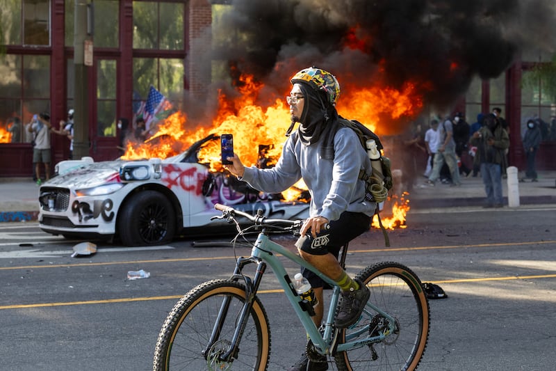 Protesters have set fire to cars and clashed with law enforcement during the unrest.