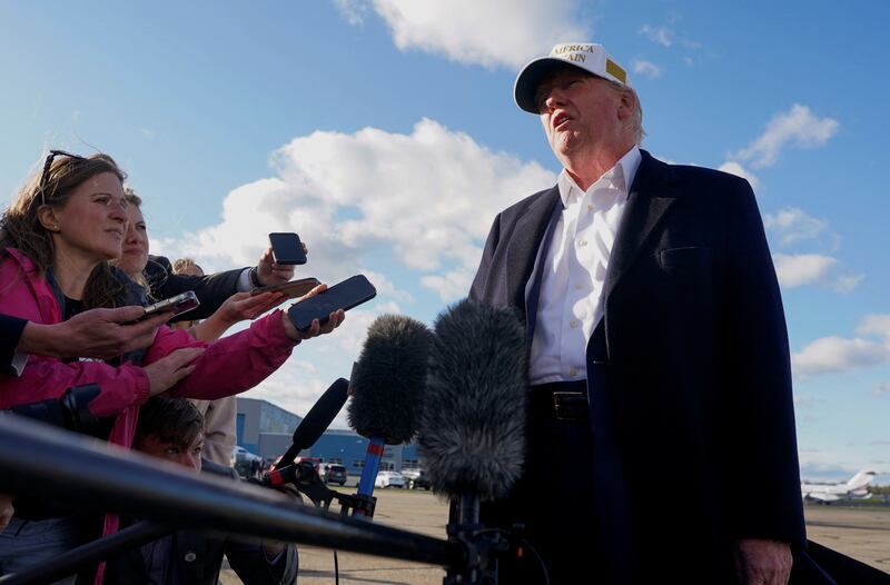 U.S. President Donald Trump speaks to the media before boarding Air Force One en route to Washington, D.C, at Morristown Municipal Airport in Morristown, New Jersey, U.S., April 27, 2025. REUTERS/Nathan Howard
