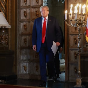 Donald Trump arrives for a press conference with Speaker of the House Mike Johnson (R-LA) at Mr. Trump's Mar-a-Lago estate on April 12, 2024, in Palm Beach, Florida.
