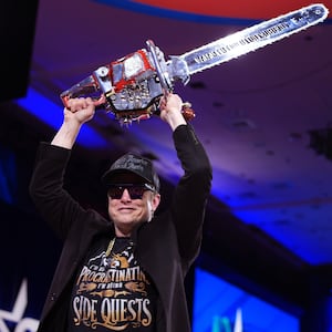 OXON HILL, MARYLAND - FEBRUARY 20: CEO of Tesla and SpaceX Elon Musk leaves the stage holding a chainsaw after speaking at the Conservative Political Action Conference (CPAC) at the Gaylord National Resort Hotel And Convention Center on February 20, 2025 in Oxon Hill, Maryland.