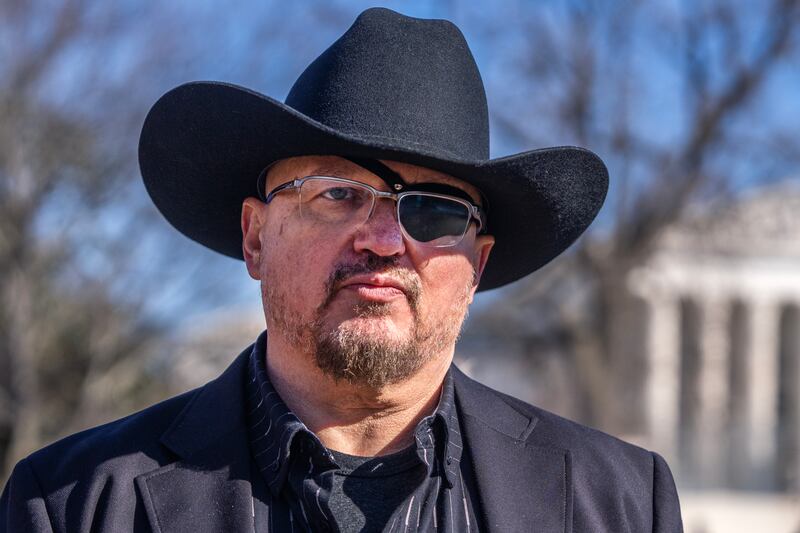 Stewart Rhodes, wearing a cowboy hat and his eye patch, after a news conference at the US Capitol in February.