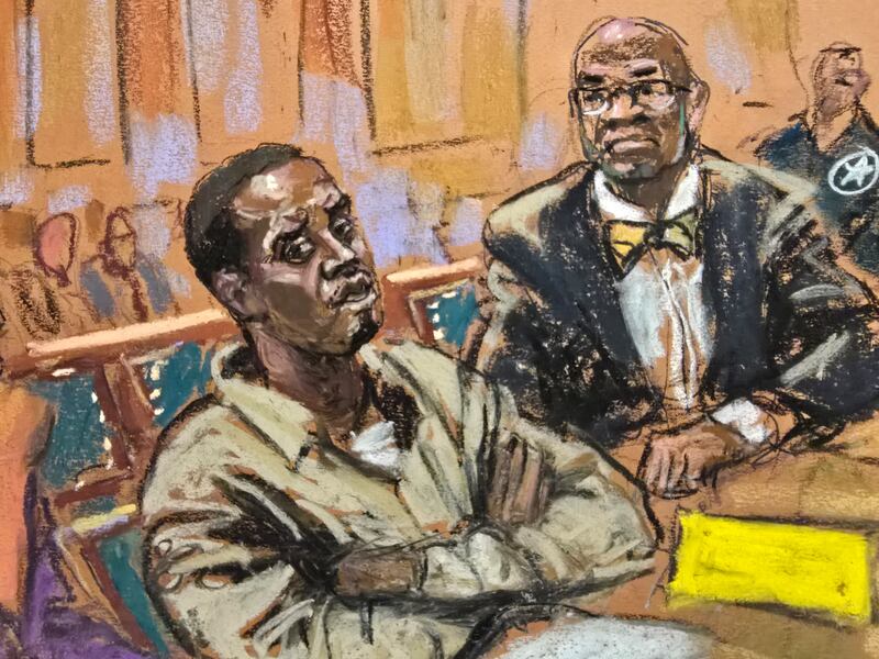 Sean "Diddy" Combs listens accompanied by attorney Anthony Ricco, on the day of his hearing on his request to be released from jail pending trial in New York City, U.S., November 22, 2024 in this courtroom sketch.