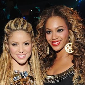 Singers Shakira and Beyonce poses for a picture backstage during the 2009 MTV Europe Music Awards