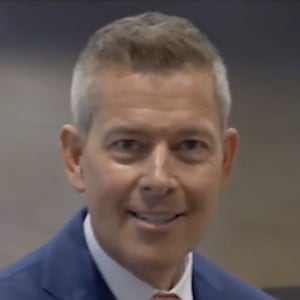 Sean Duffy points to Jesus painting.