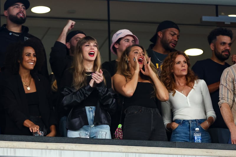 Taylor Swift and Blake Lively cheer from the stands during an NFL football game between the New York Jets and the Kansas City Chiefs at MetLife Stadium on October 1, 2023 in East Rutherford, New Jersey.