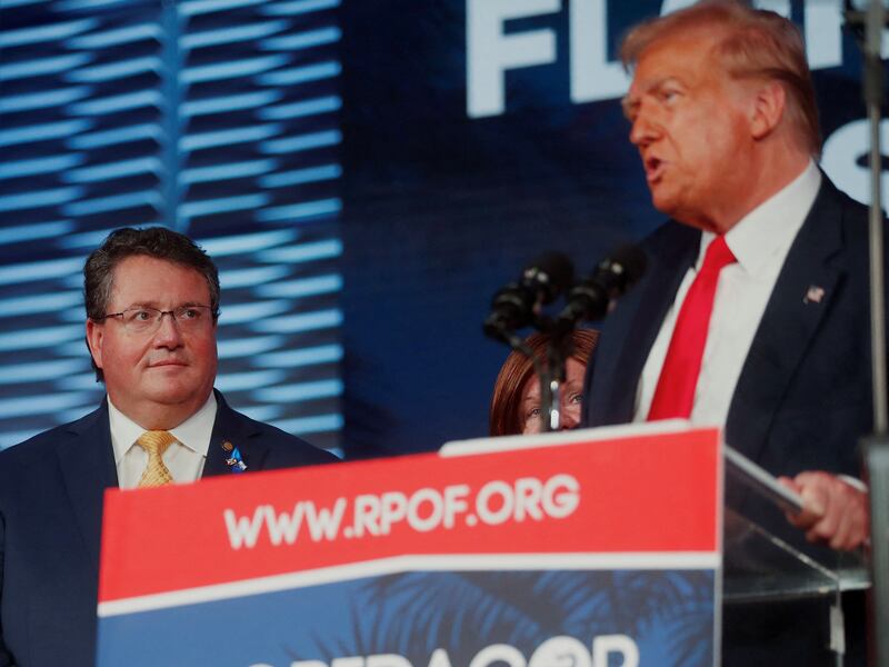 Florida State House Rep. Randy Fine looks on while former U.S. President and Presidential Republican candidate Donald Trump speaks to his supporters during the Florida Freedom Summit held at the Gaylord Palms Resort & Convention Center in Kissimmee, Florida, U.S., November 4, 2023.  REUTERS/Octavio Jones