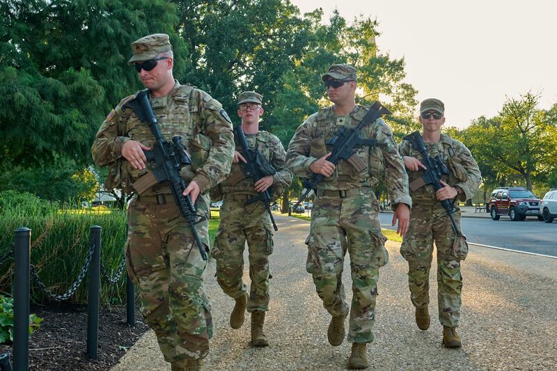 Members of the National Guard from multiple states patrol the National Mall in Washington D.C. on August 25, 2025 on orders from President Donald Trump.