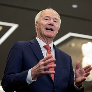 Asa Hutchinson speaks to media following the Republican Party of Iowa legislative breakfast in January 2024.