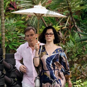 Jason Isaacs and Parker Posey
