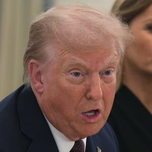 WASHINGTON, DC - SEPTEMBER 04: U.S. President Donald Trump speaks as first lady Melania Trump listens during a dinner at the State Dining Room of the White House on September 4, 2025 in Washington, DC. President Donald Trump hosted tech and business leaders for dinner after they joined first lady Melania Trump's meeting of the Artificial Intelligence (AI) Education Task Force at the White House this afternoon. (Photo by Alex Wong/Getty Images)