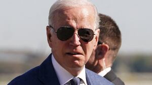 U.S. President Joe Biden is accompanied by his son, Hunter Biden, and his sister, Valerie Biden Owens, while boarding Air Force One
