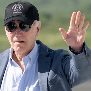 US President Joe Biden waves as he disembarks from Air Force One upon arrival at Henry E. Rohlsen Airport in Christiansted, St. Croix, on the US Virgin Islands, on December 26, 2024, as he arrives for a week-long visit.