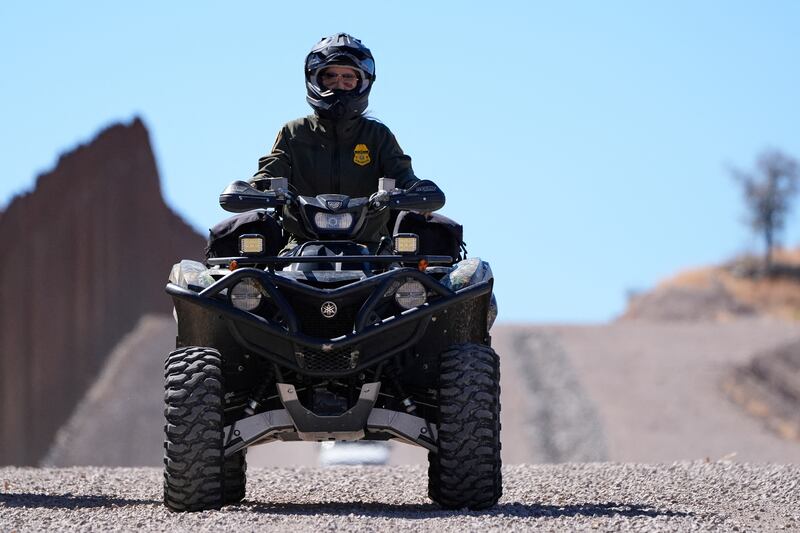 Kristi Noem rides a four-wheeler